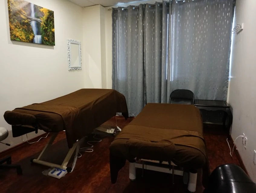 Second massage room with soft lighting